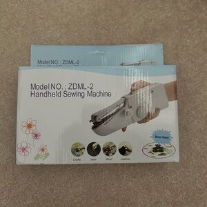 Handheld sewing tool